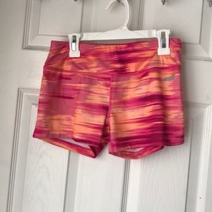 Orange and pink spandex shorts